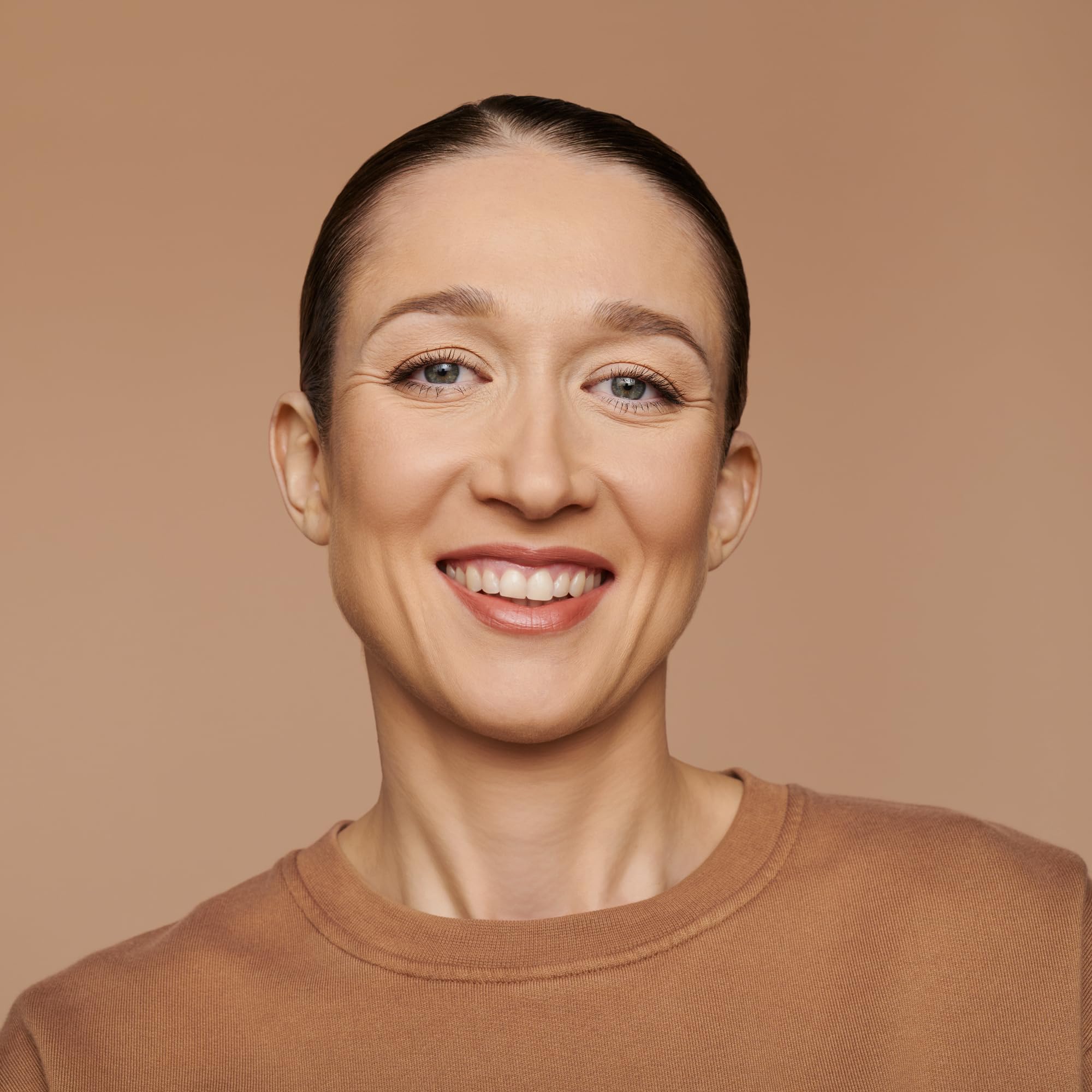 Catrice Niacinamide-infused formula refines skin texture beneath makeup for a soft-focus finish