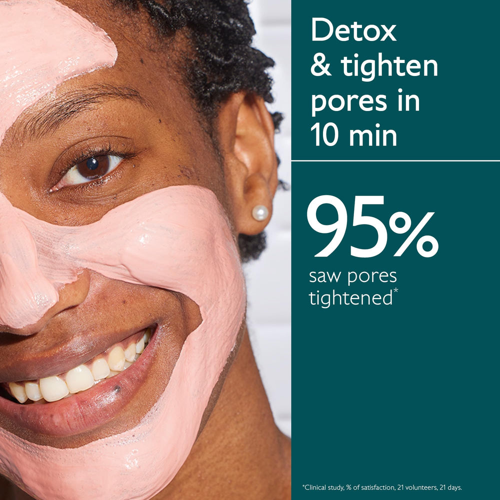 Caudalie Instant Detox Mask close-up shows pink clay texture on skin.