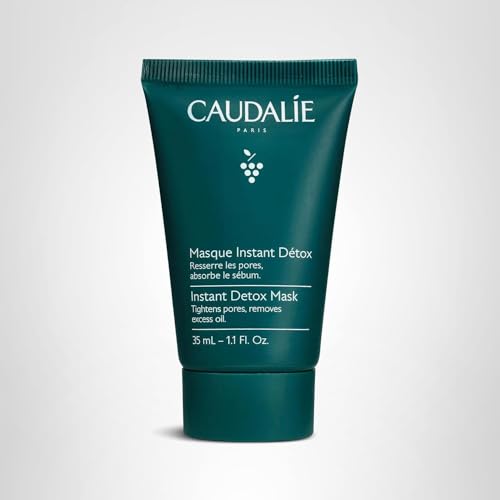 Caudalie Instant Detox Mask texture on skin highlighting pink clay benefits.