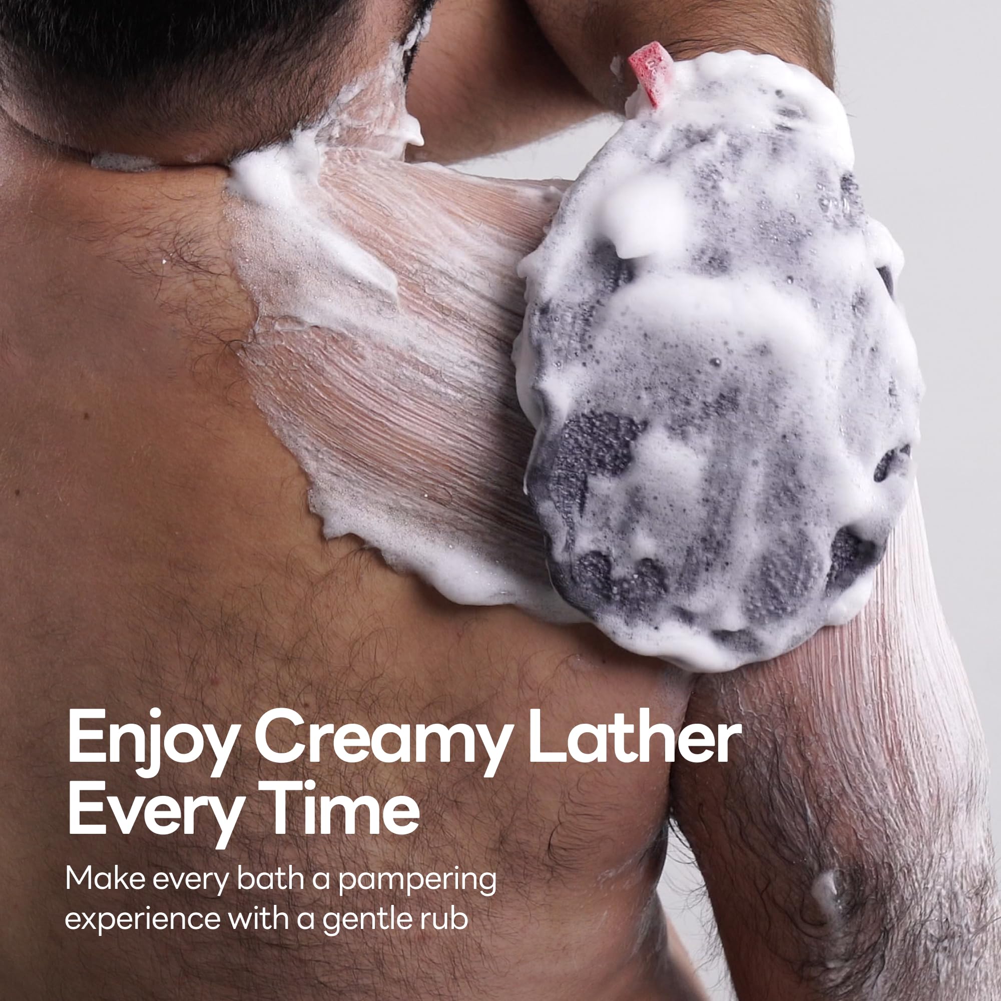 Caveem Exfoliating Mitt hanging loop enables easy drying and storage