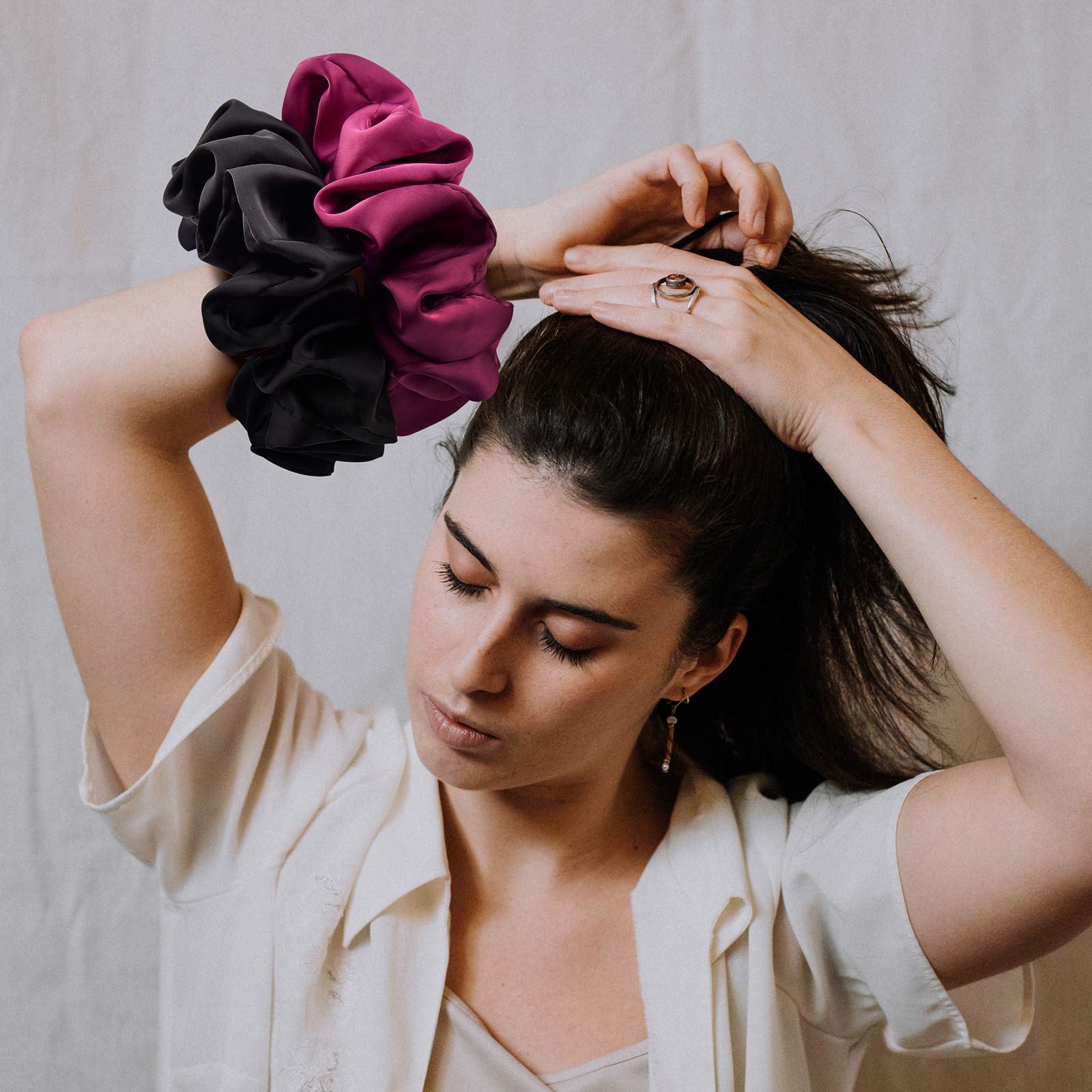 CEELGON green silk scrunchies protect long hair during high-pony or bun styles.