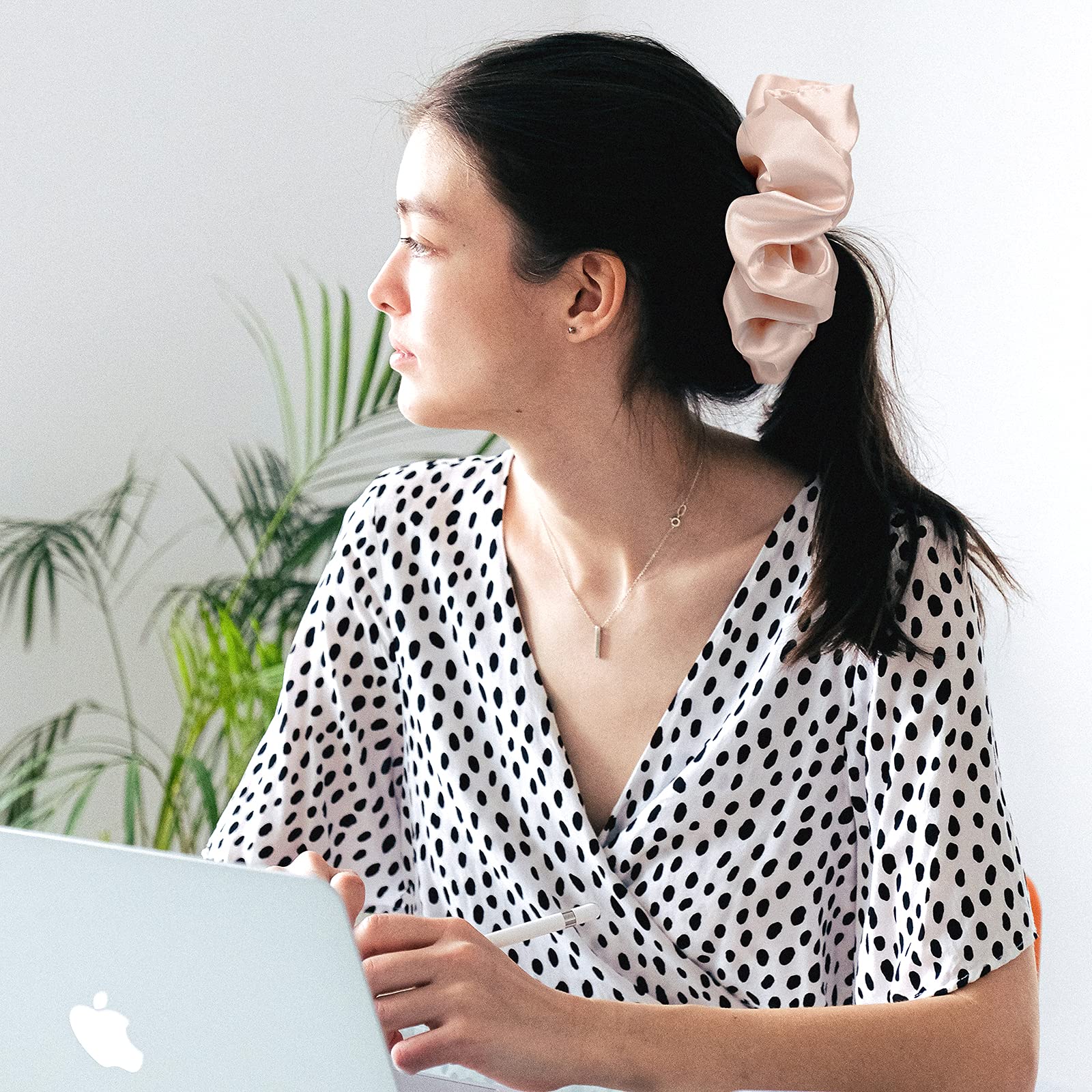 CEELGON green satin scrunchie close-up highlights soft touch and tangle-free wear