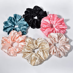 CEELGON pink satin silk scrunchie close-up with crease-free hold for thick hair