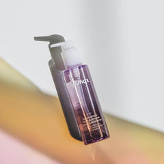 Celimax Derma Nature Fresh Blackhead Cleansing Oil under running water showing clean rinse.