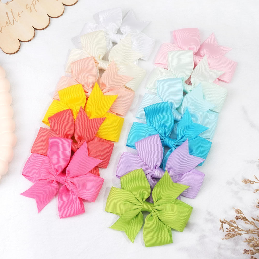 CÉLLOT bows shown on ponytails and braids for easy styling.