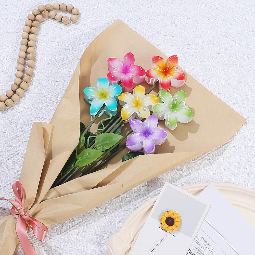 CHANDAT Hawaiian claw clip hibiscus-petal design adds tropical flair and secure hold.