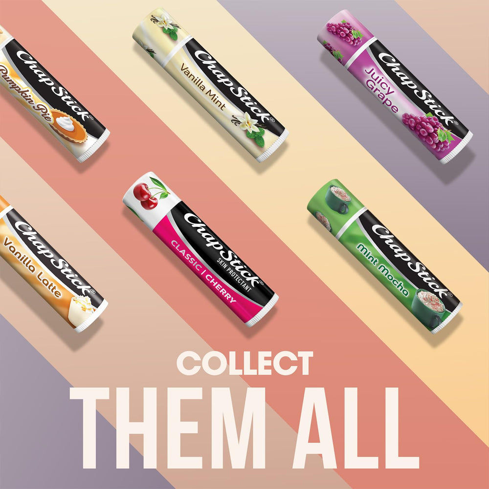 ChapStick bulk cherry lip balm 24-pack on desk with hand ready for quick rehydration.