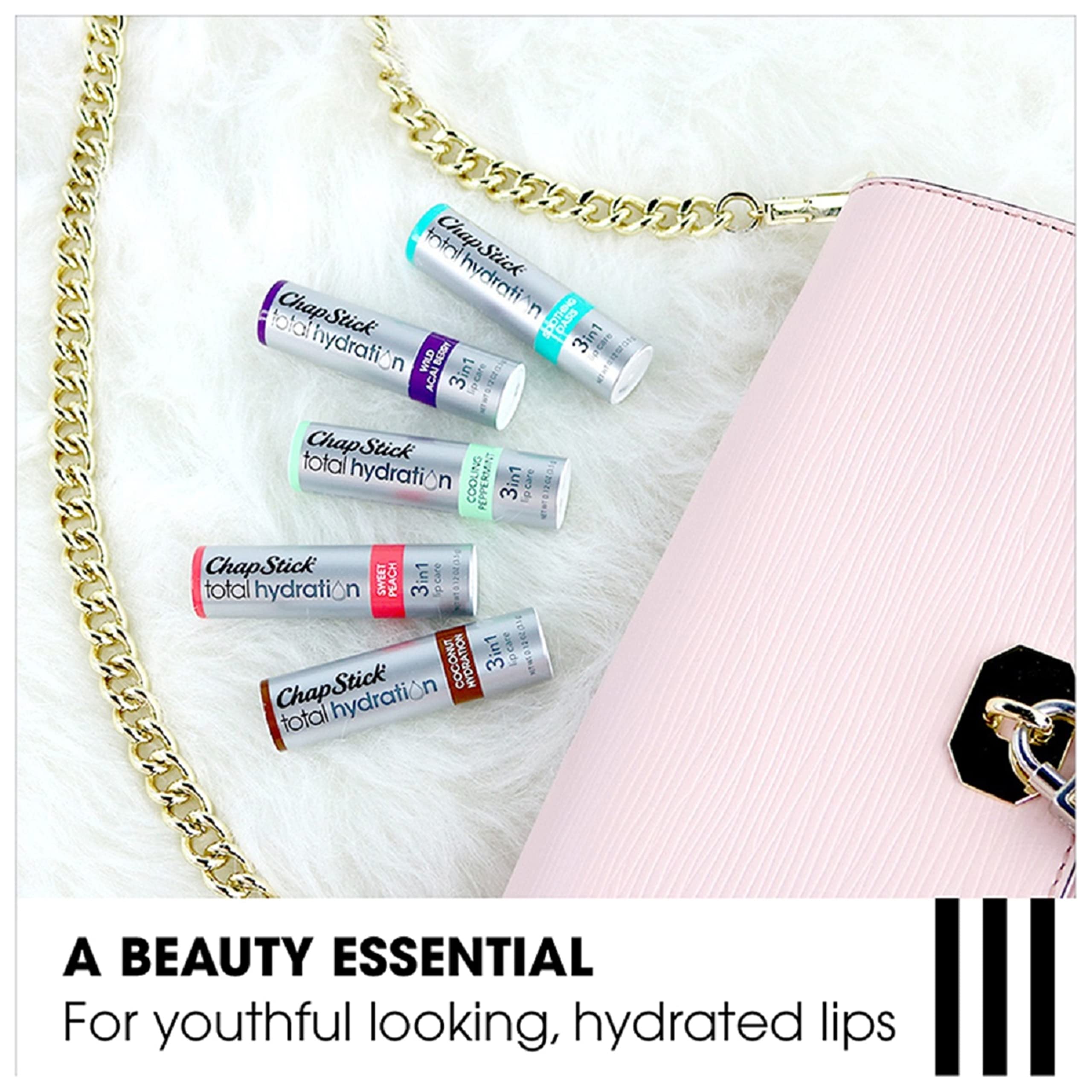 ChapStick Total Hydration Coconut Lip Balm handheld; convenient lip care at work or home.