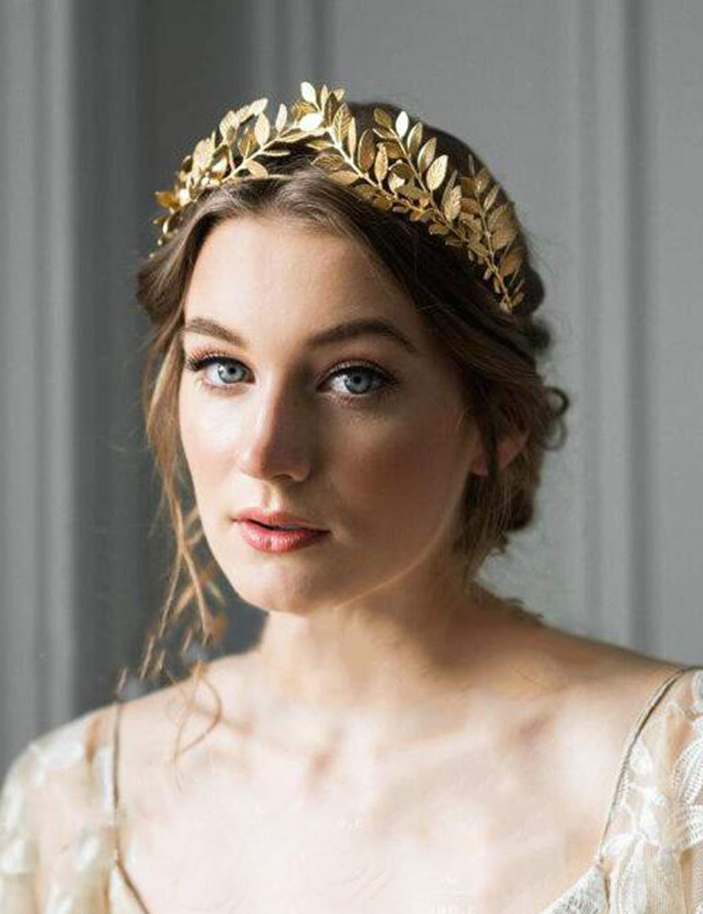 Chargances gold-leaf tiara headband adds vintage charm for bridesmaids.