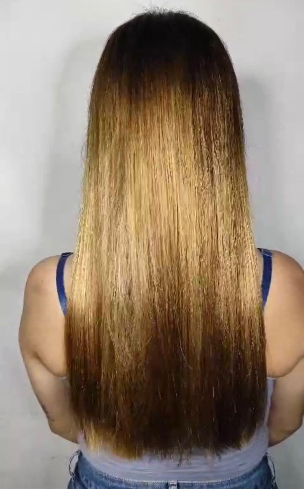 Close-up of chocolate infusion in CHELLY keratin suggesting premium care.