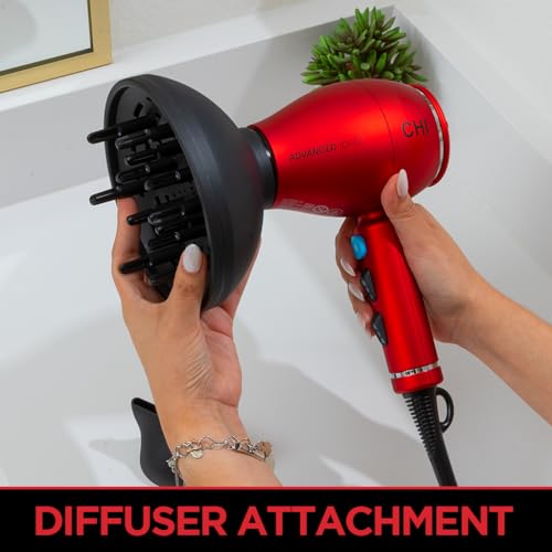 CHI 1875 Series compact dryer in hand demonstrates lightweight travel styling.