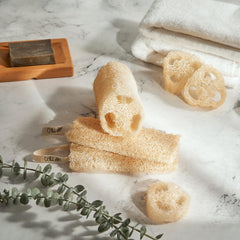 Chill Ah loofah sponge texture close-up highlights natural fibers for gentle exfoliation.
