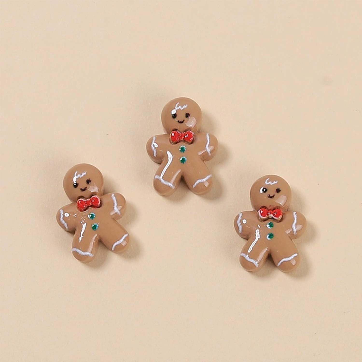 Christmas nail decor gingerbread-man detail emphasizes resin design