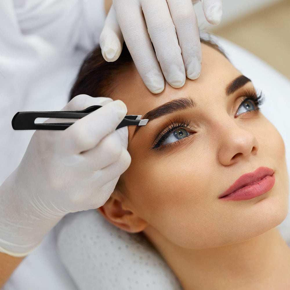 Chumia tweezers removing splinters and blackheads with clean, precise plucking.