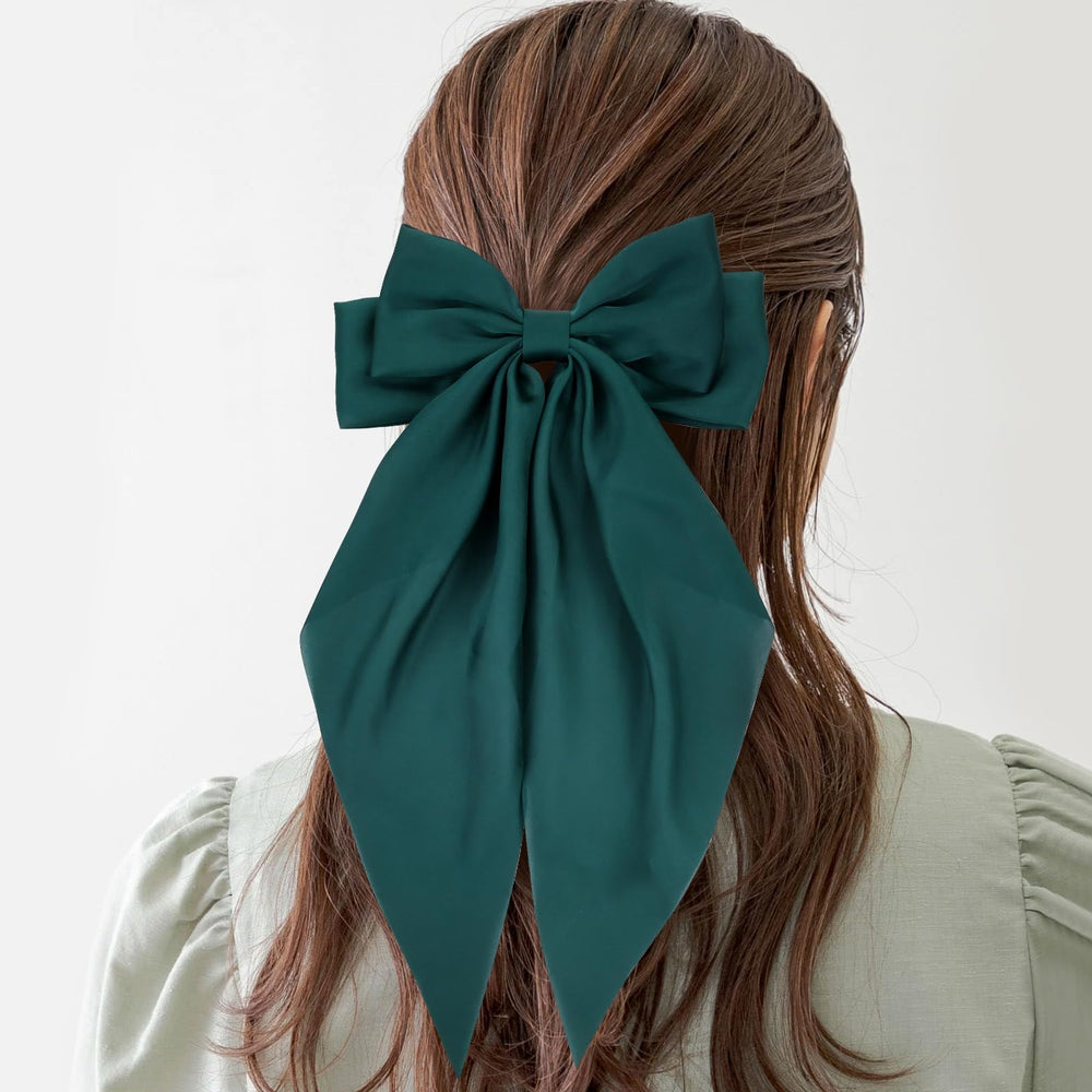 Cinaci red satin bow hair clip adds vibrant focal point