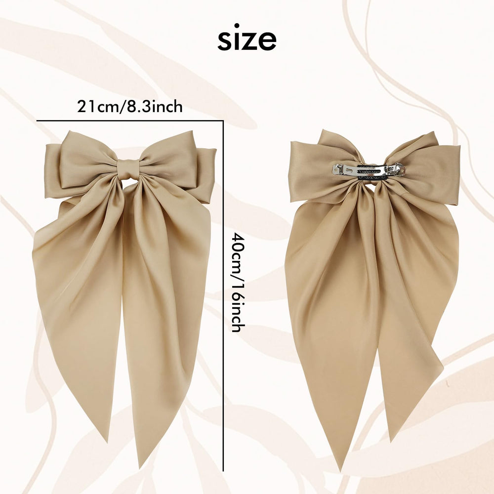 Cinaci brown large bow clip complements warm-toned outfits