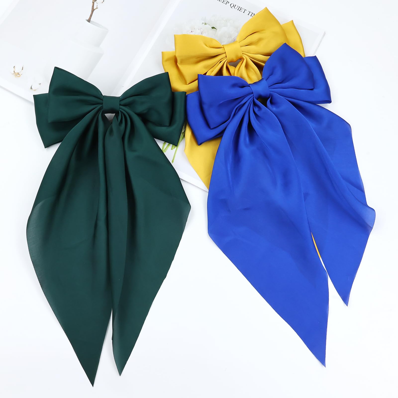 Cinaci black satin bow clip for versatile styling options