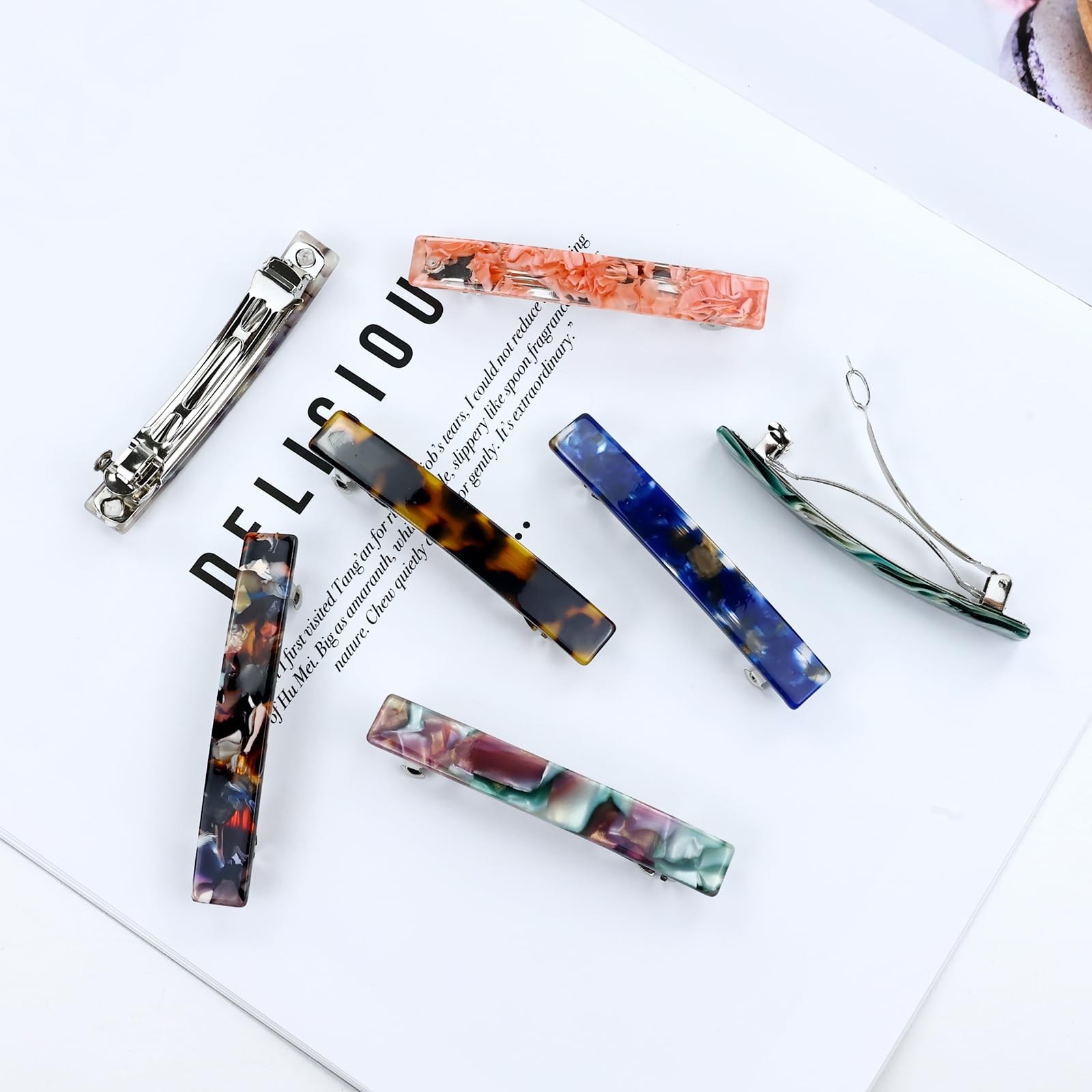 Cinaci glossy black barrette clip highlights durable spring for long-lasting use.