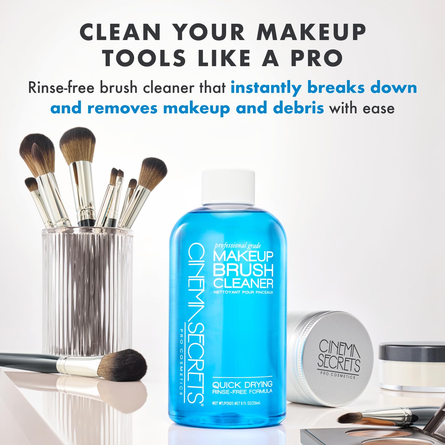 Cinema Secrets blue vanilla cleaner spray bottle with mist for on-the-go cleaning.