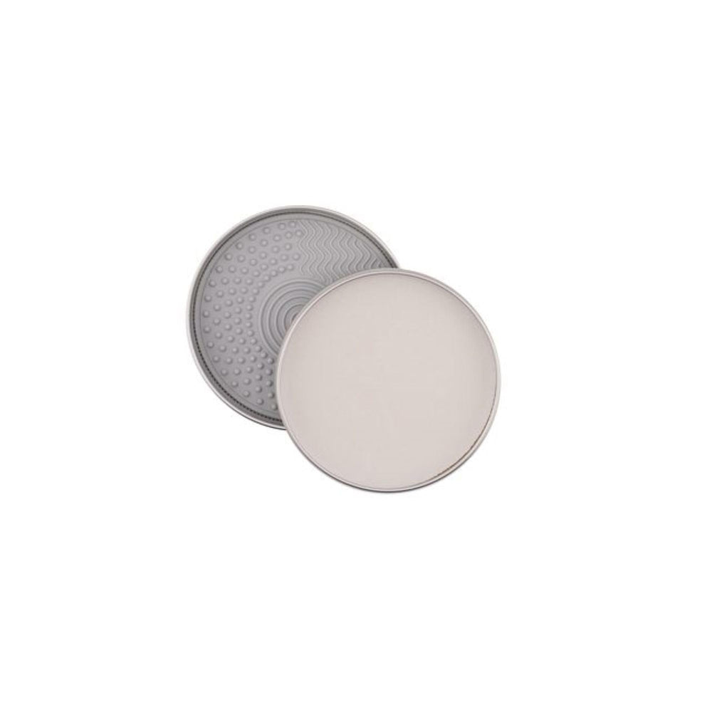Cinema Secrets scrubber included close-up demonstrates quick, thorough brush cleaning.