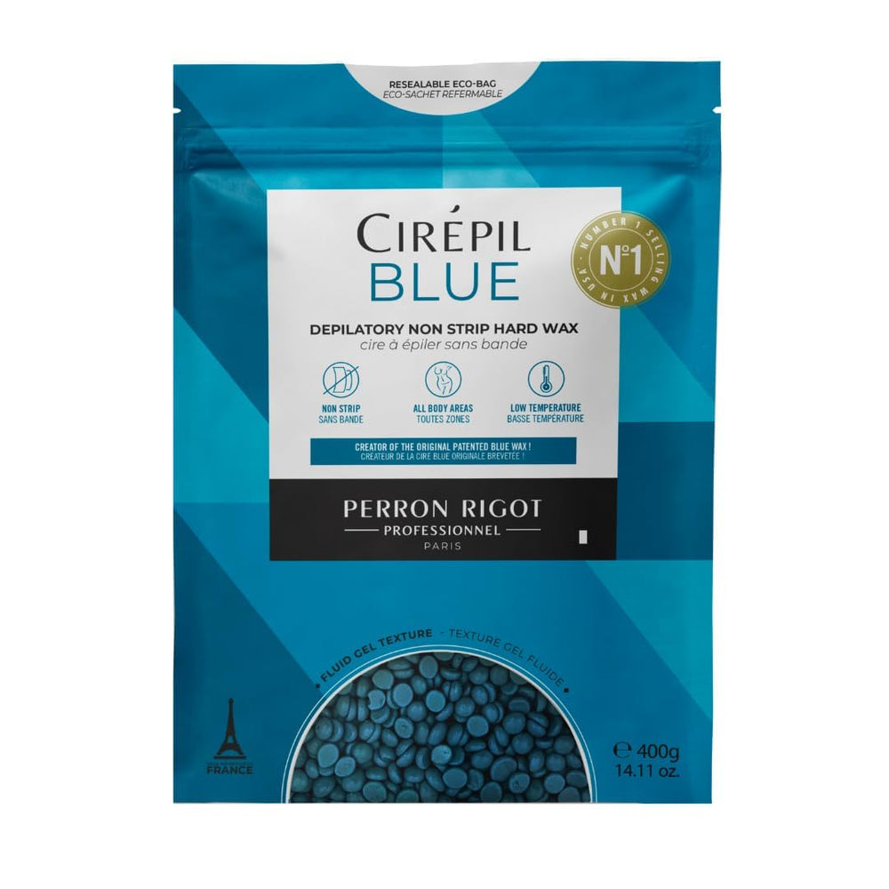 Cirepil Blue wax beads being poured into warmer for smooth hair removal.