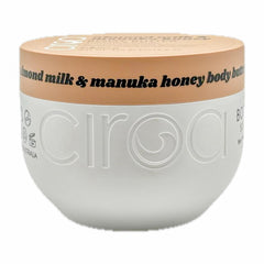 ciroa almond milk manuka honey body butter in hand, soothing hydration.