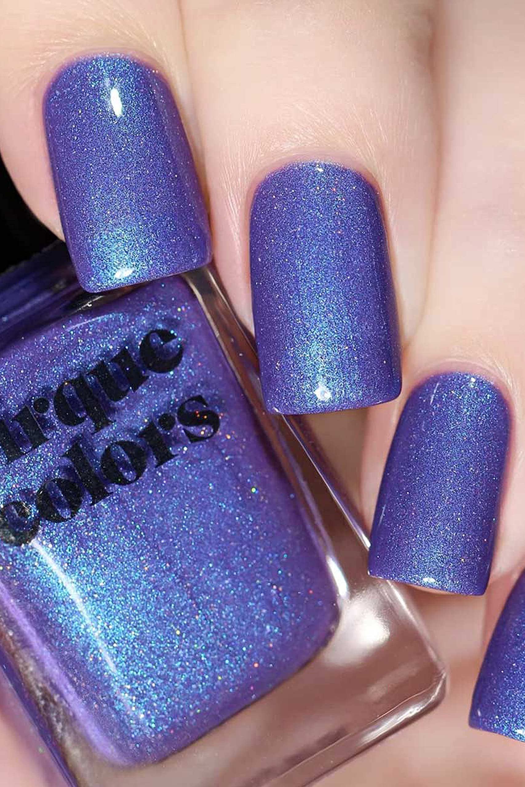 Cirque Colors Luna teal shimmer detail adds depth and subtle sparkle to the look.