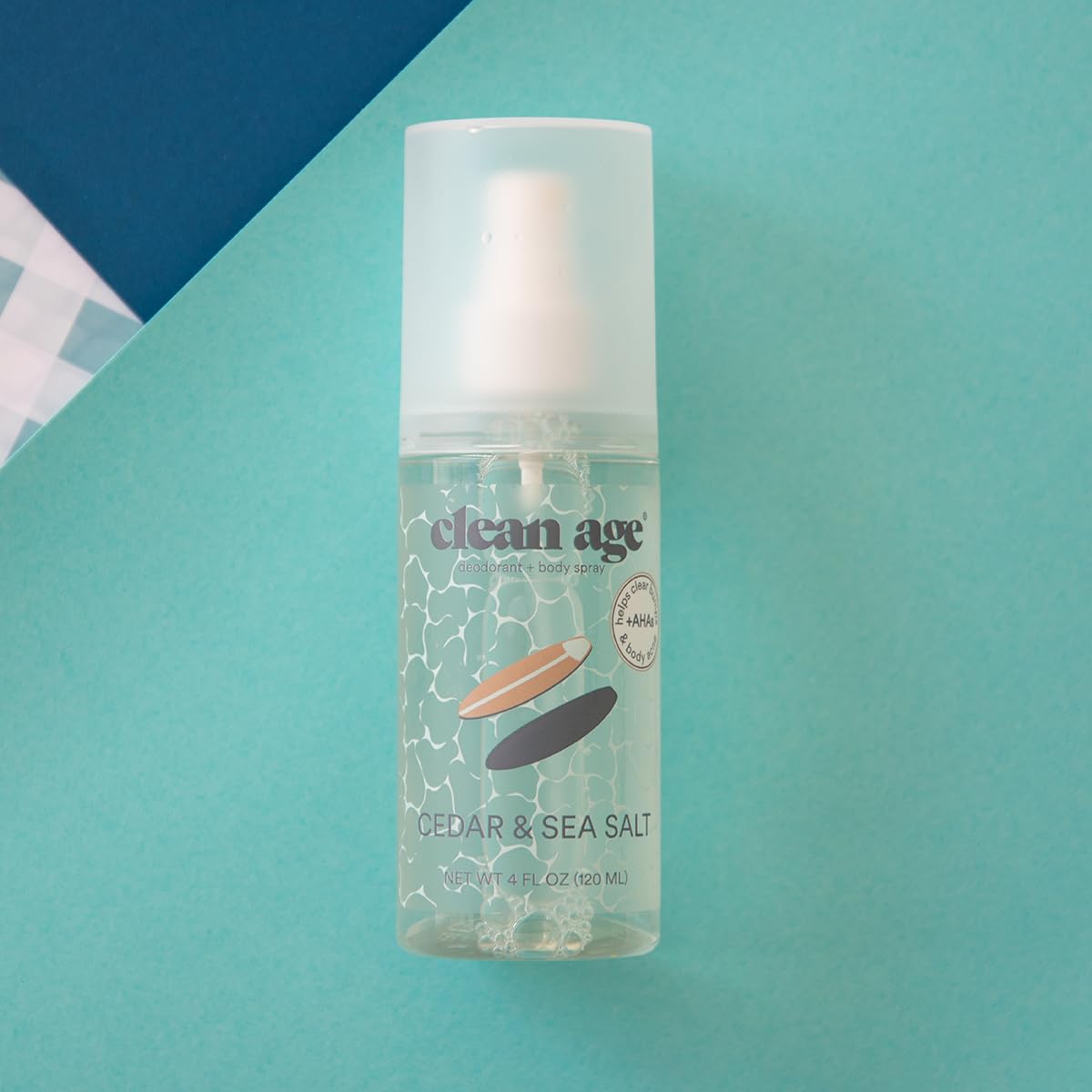 Clean Age cedar body spray bottle shown for all-day teen freshness