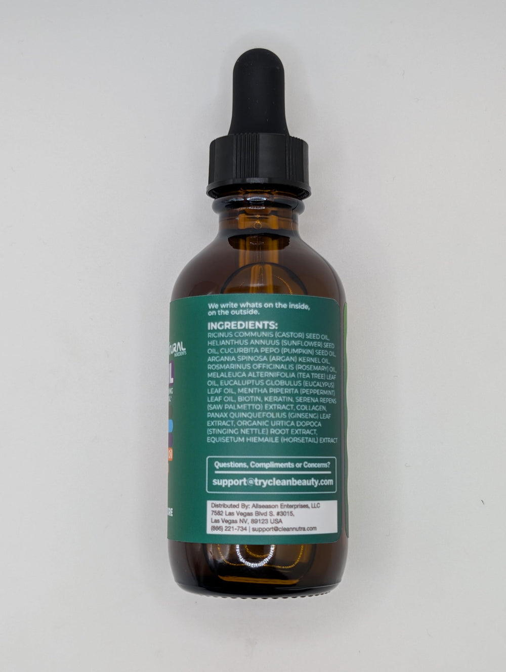 Clean Beauty Batana Oil pump illustrates rich nourishment for dry strands.