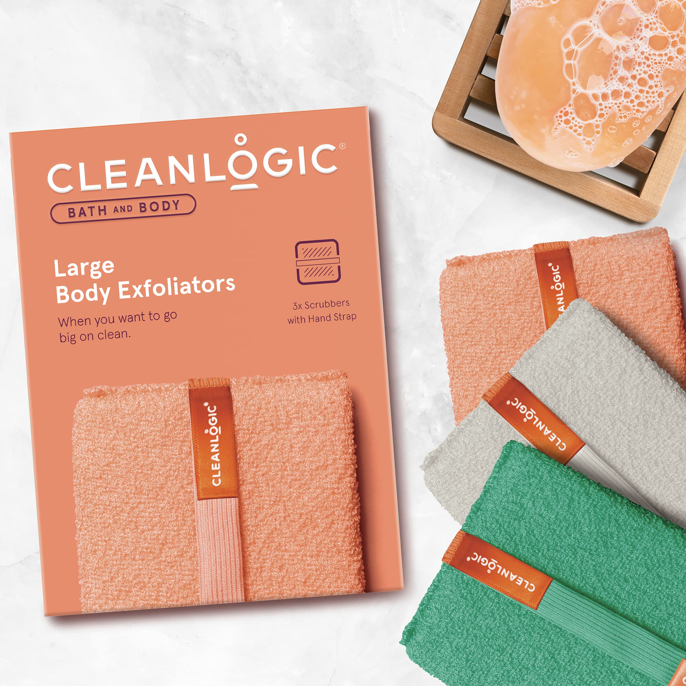 Cleanlogic scrubber hands-holding demonstrates easy grip for comfortable shower exfoliation