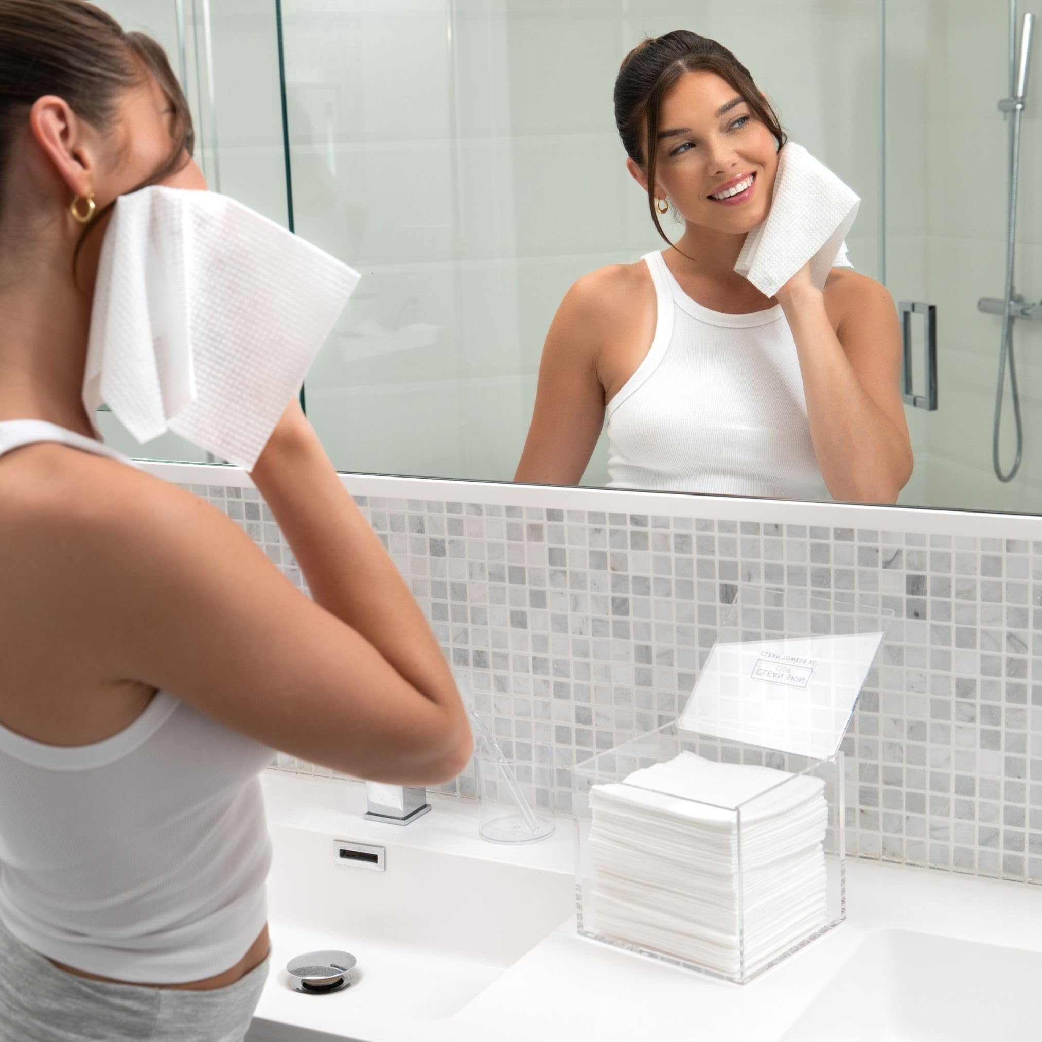 CLEAN SKIN CLUB box with lid open highlights easy access to daily towels for routines.