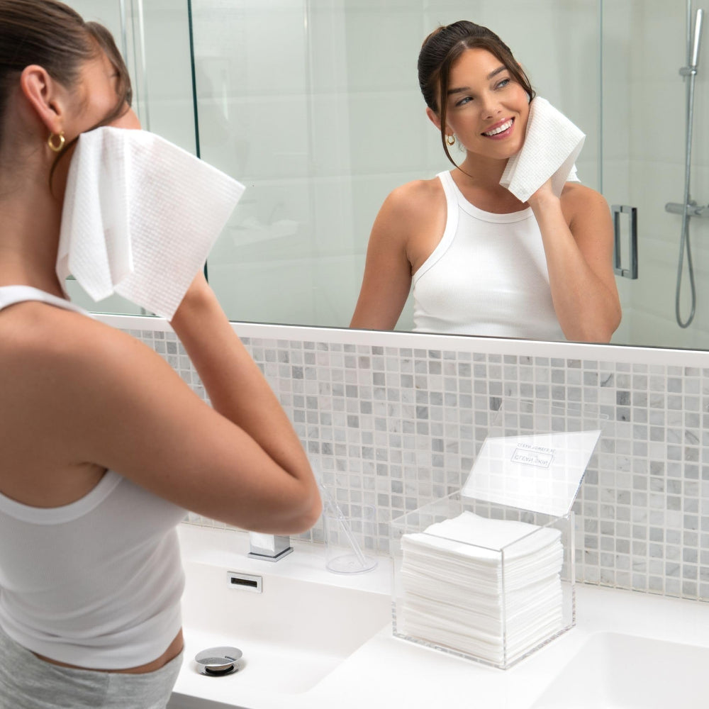 CLEAN SKIN CLUB box with lid open highlights easy access to daily towels for routines.