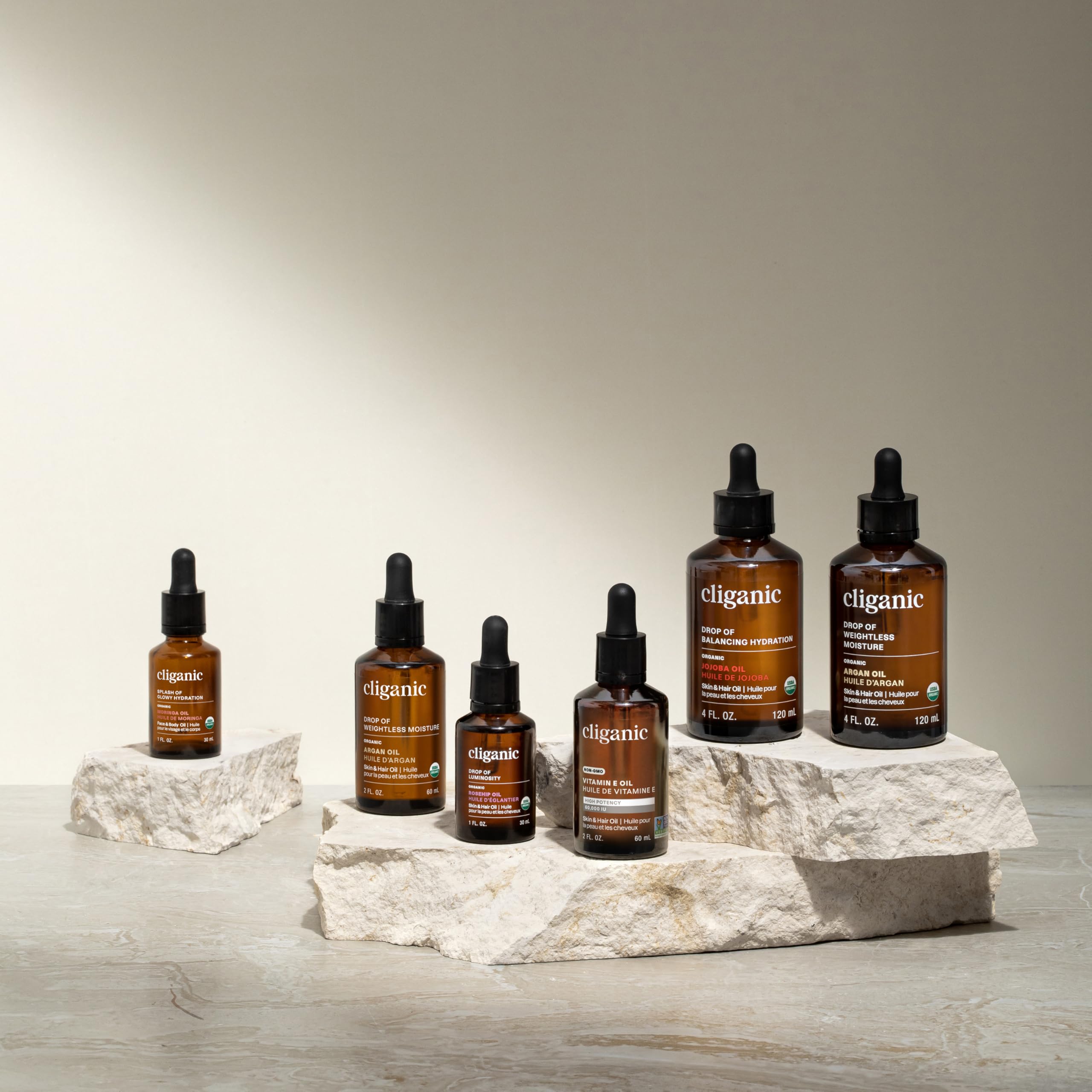 Hands applying Cliganic Baobab Oil for a lightweight, hydrating skincare routine.