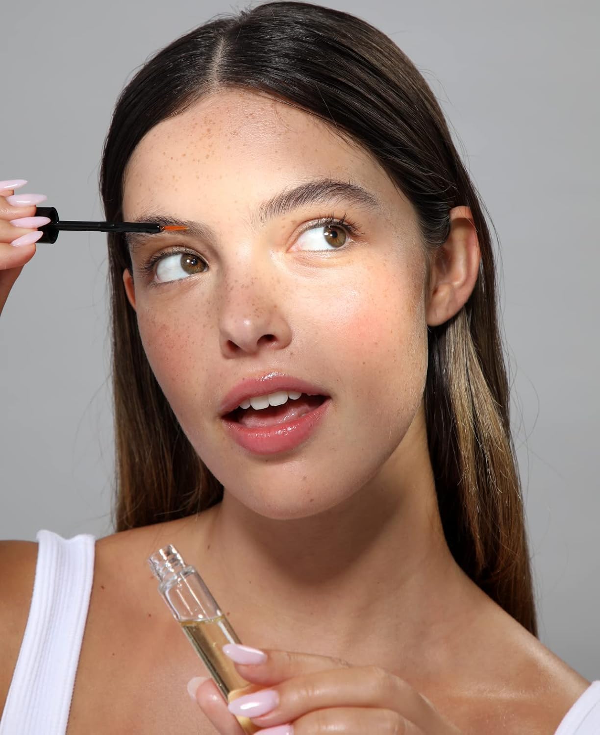 Cliganic Castor Oil application tools kit photo shows included wand and brush