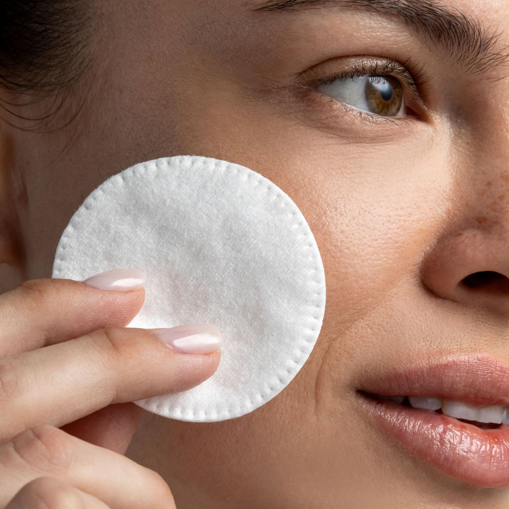 Cliganic pad in hand displaying size and gentle feel