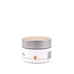 Climbskin hand cream on chalk-dusted hands during training for grip-ready moisture.