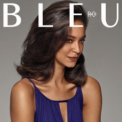 Close-up of R+Co BLEU label signaling strengthened hair and added shine