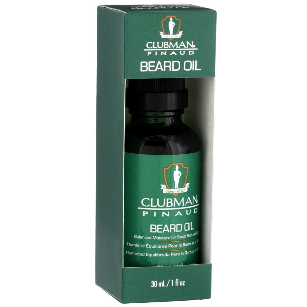 Close-up of nozzle dispensing Clubman Pinaud Beard Oil for precise use.