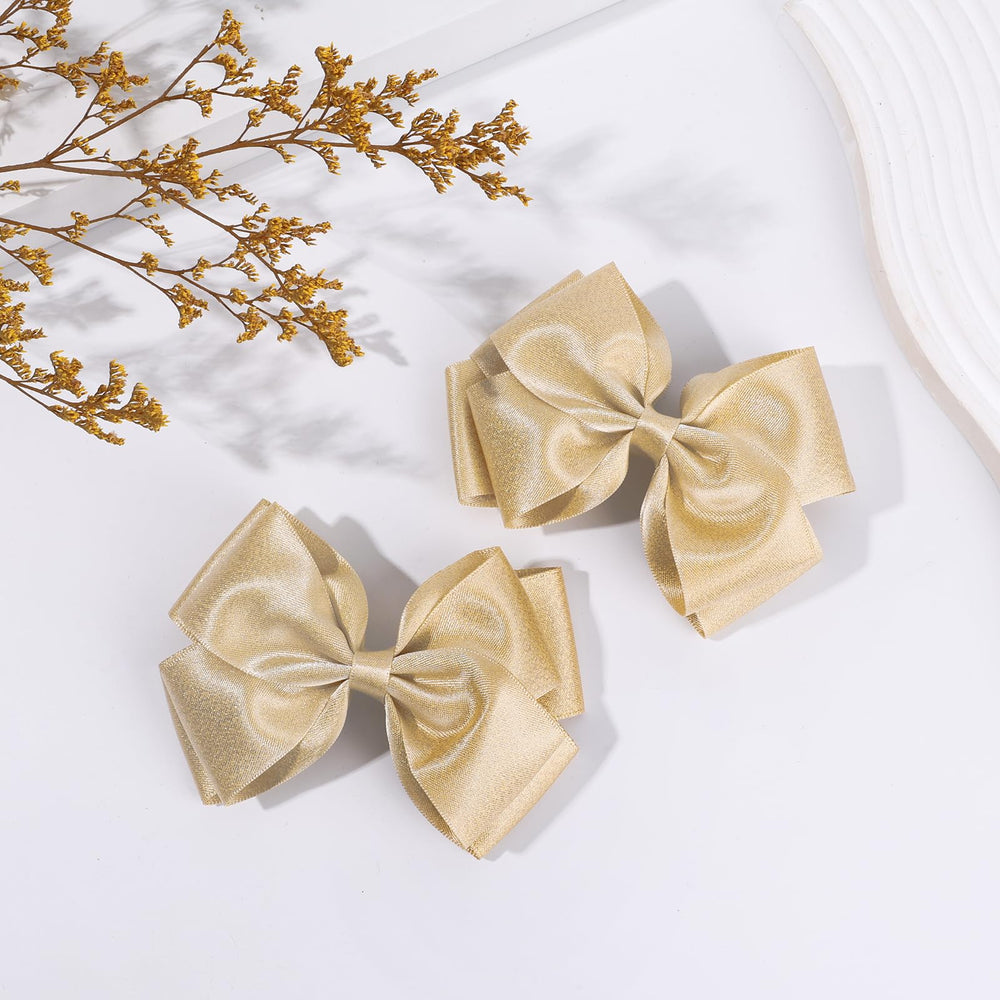 CN gold glitter hair bow clip is lightweight for comfortable all-day wear