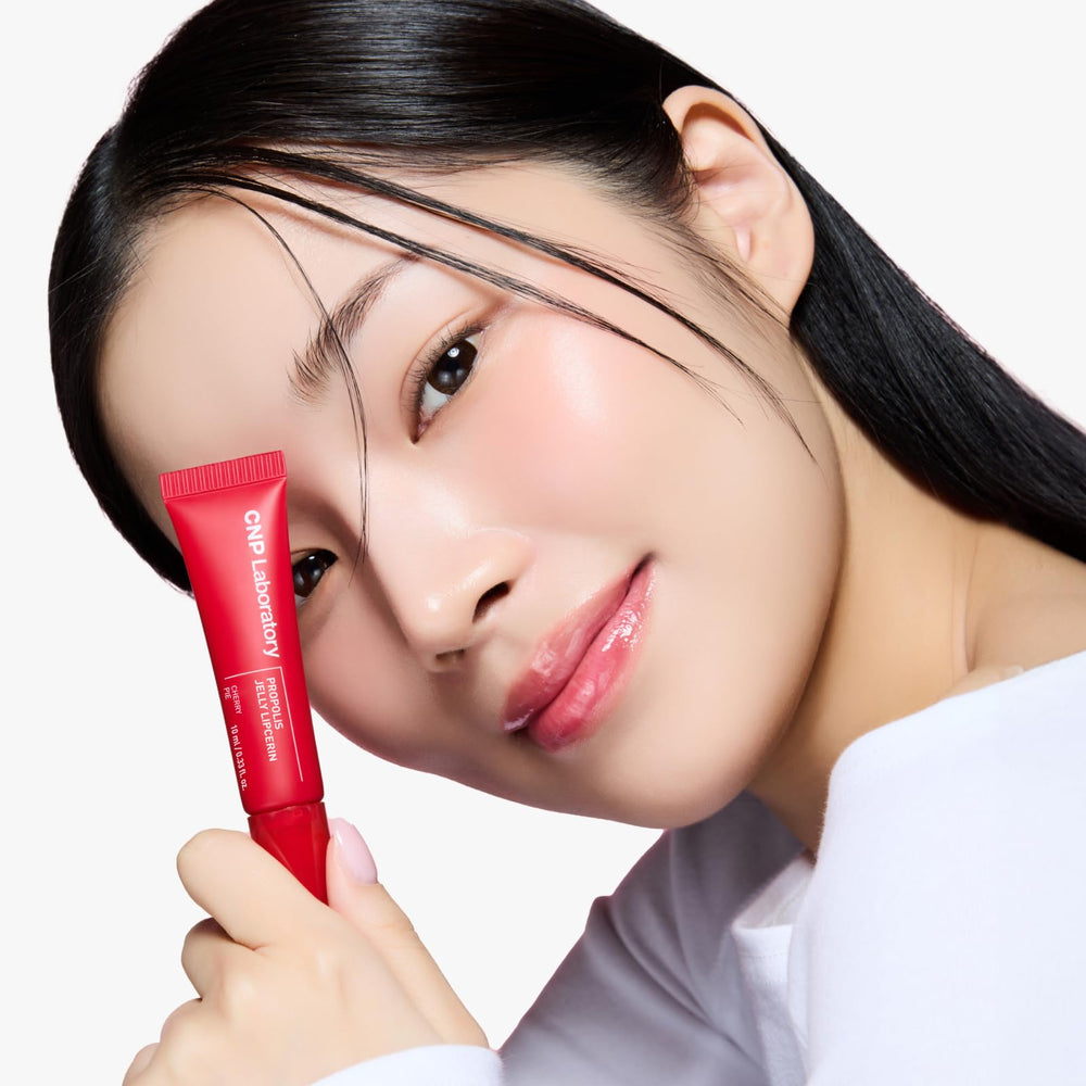 CNP Propolis Jelly Lipcerin 04 Cherry Pie gloss closeup reveals vibrant color and long-lasting shine.
