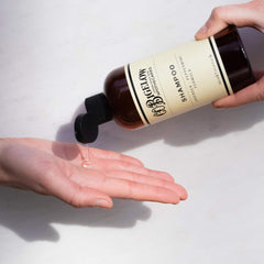 C.O. Bigelow Lavender Peppermint Shampoo rinse image shows clean, light hair.