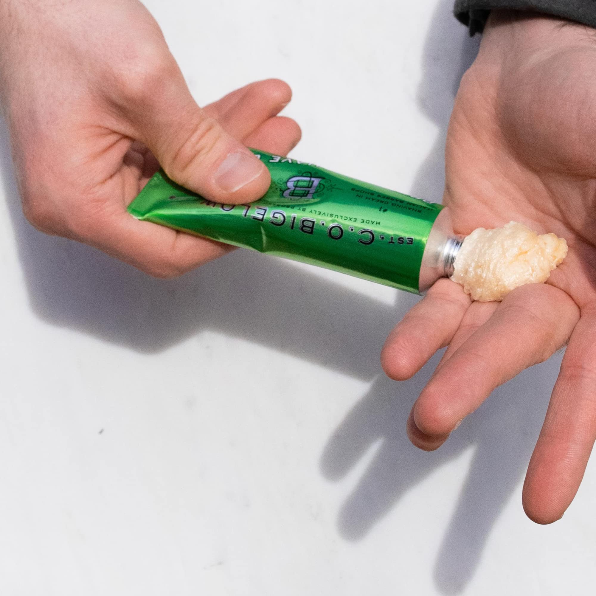 C.O. Bigelow shaving cream demonstrated for facial and body shaving.