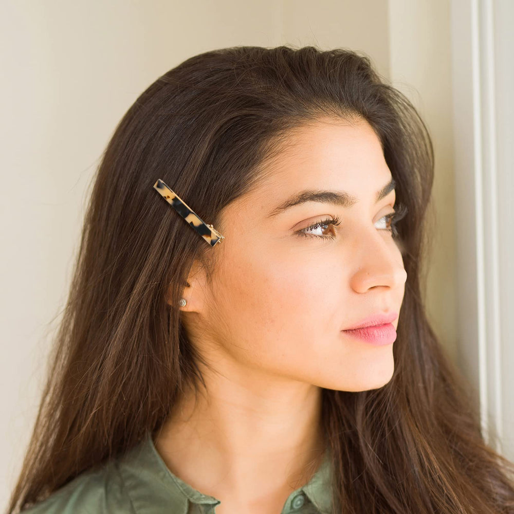 Cobahom leopard-print tortoise-shell hair clip worn to create quick updo
