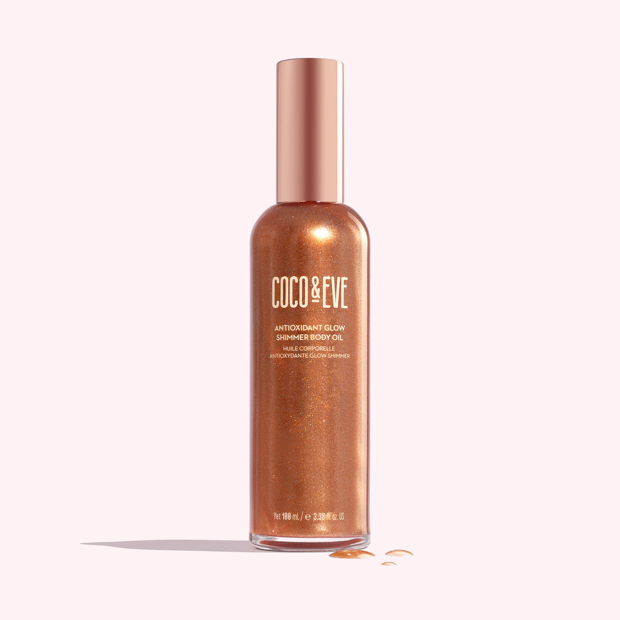 Coco & Eve Antioxidant Glow Shimmer Bottle Pour demonstrates even distribution for shimmer.