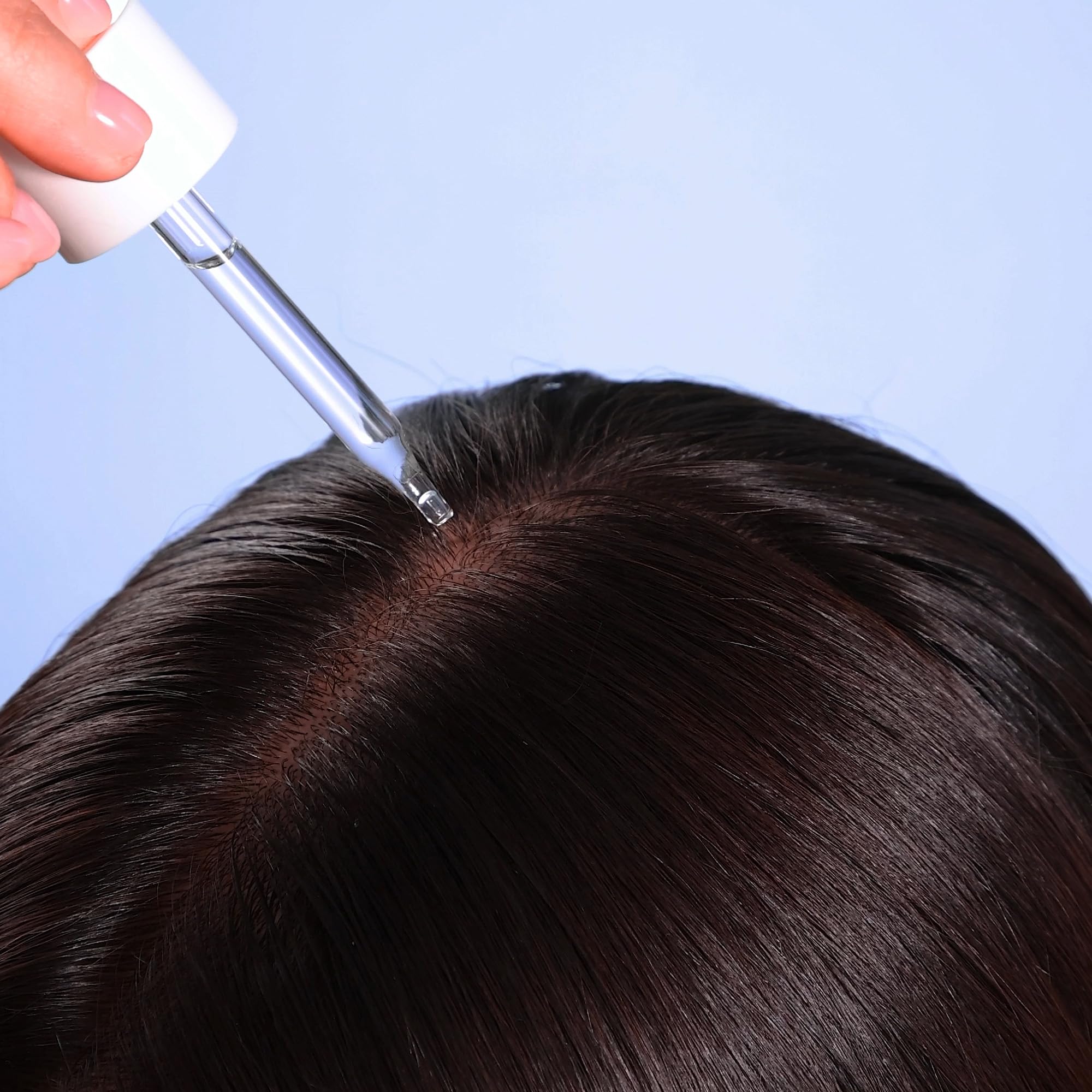 Coco & Eve Boost Therapy scalp application being massaged in