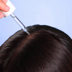 Coco & Eve Boost Therapy scalp application being massaged in