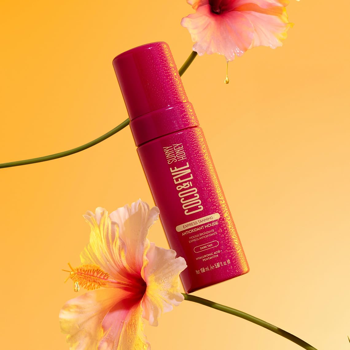 Coco & Eve Express Tanning Mousse skin tone development on arm shows deep tan progression.