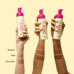 Coco & Eve Sunny Honey Bali Self Tanner Mousse on legs delivering natural bronze glow