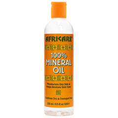 COCOCARE Africare mineral oil bottle front view for fragrance-free skin moisture