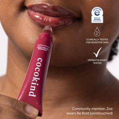 Cocokind Ceramide Lip Blur Balm Be Bold Burgundy swatch on lips showing sheer tint